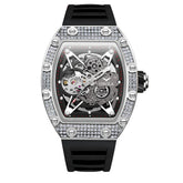 Skeleton dial luxury wristwatch with silver case, crystal accents, and black rubber strap