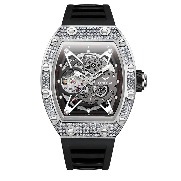 Skeleton dial luxury wristwatch with silver case, crystal accents, and black rubber strap