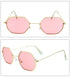 Octagon pink lens sunglasses with gold metal frame, oversized, modern streetwear style.
