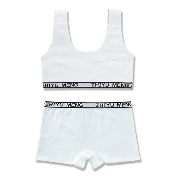 White cotton sports bra and boxer shorts set with black elastic waistband and logo