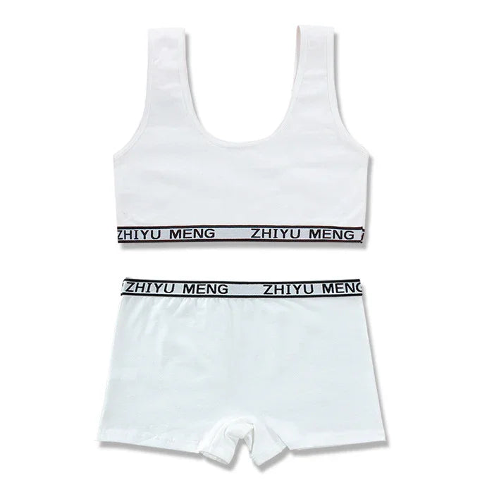 White cotton sports bra and boxer shorts set with black elastic waistband and logo