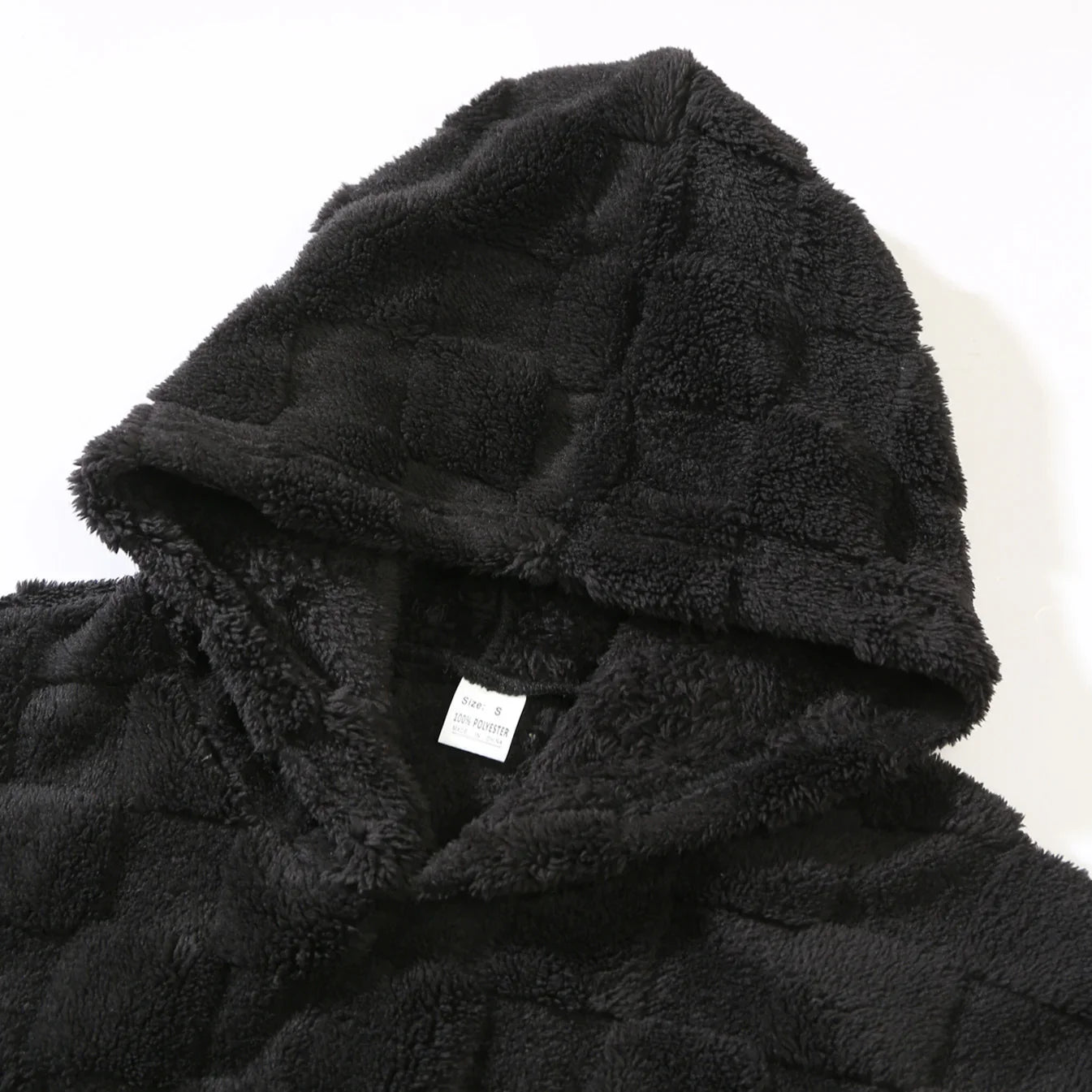Black plush fleece hooded jacket with grid texture, relaxed fit, cozy streetwear style