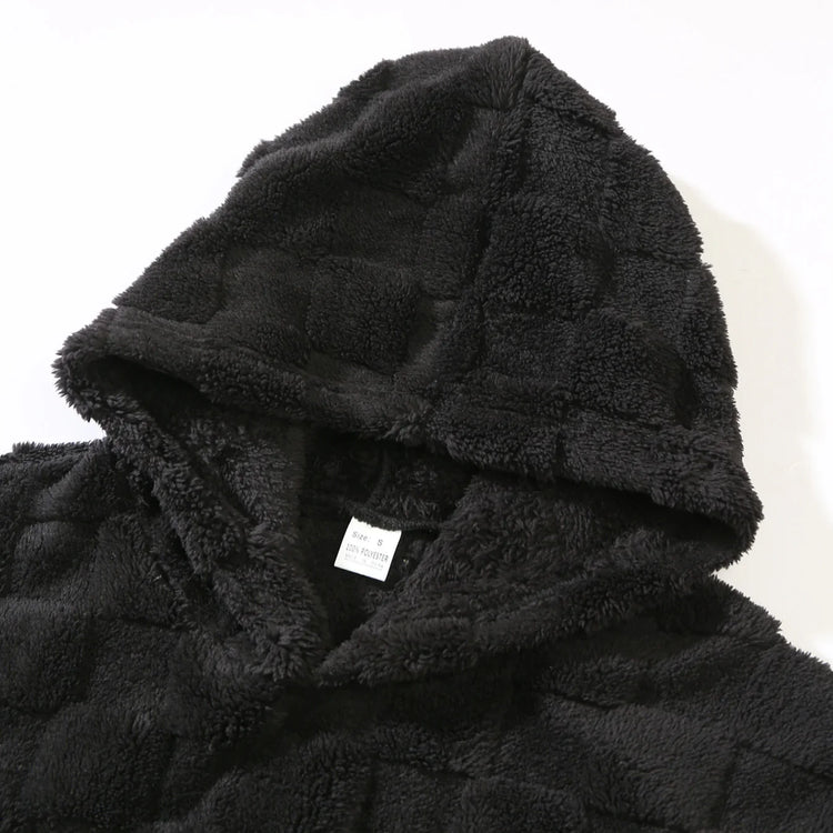 Black plush fleece hooded jacket with grid texture, relaxed fit, cozy streetwear style