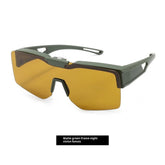 Matte green futuristic sunglasses with wide amber night vision lenses and angular design.