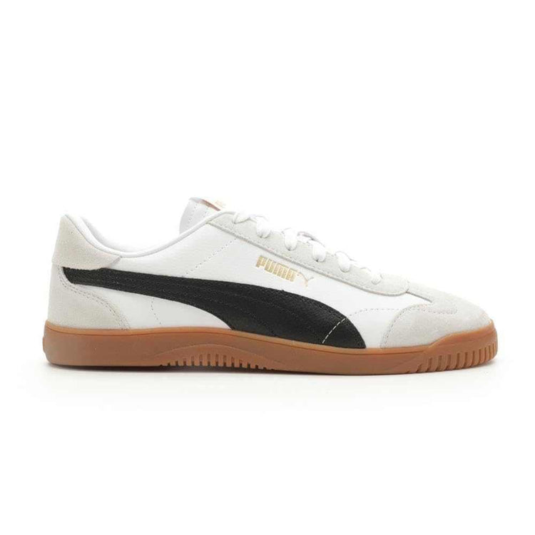 Low-top white sneaker with black side stripe, gum sole, and suede detailing