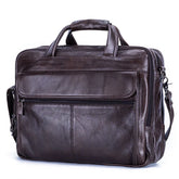 Brown leather messenger bag with zipper pockets and adjustable shoulder strap, structured fit