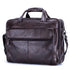 Brown leather messenger bag with zipper pockets and adjustable shoulder strap, structured fit