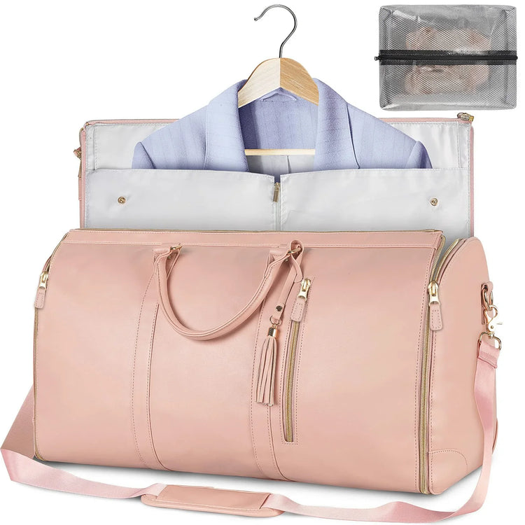 Light pink faux leather duffel bag, gold zippers, detachable strap, includes garment holder.
