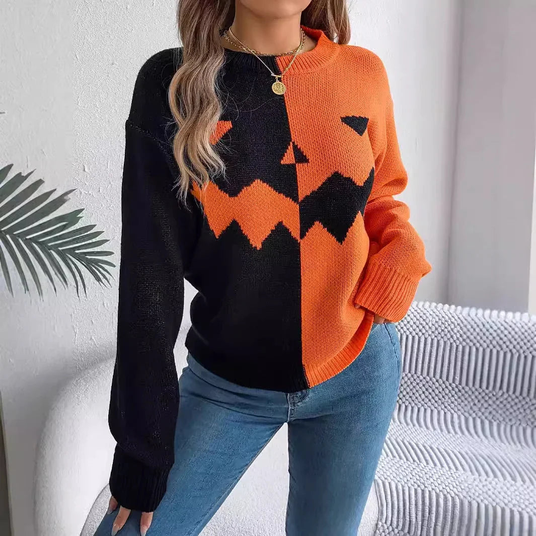 Color block orange and black pumpkin face sweater, relaxed fit, paired with blue jeans.