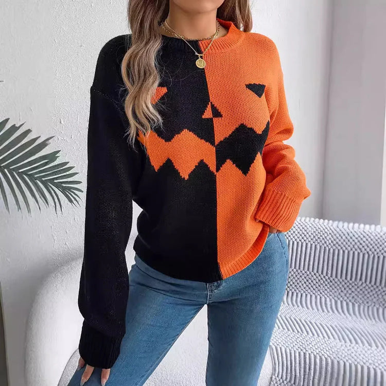 Color block orange and black pumpkin face sweater, relaxed fit, paired with blue jeans.