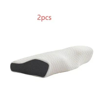 Contoured memory foam pillow with white textured cover and black side panel, ergonomic shape