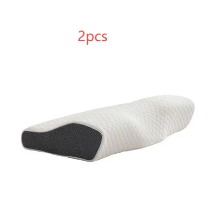 Contoured memory foam pillow with white textured cover and black side panel, ergonomic shape
