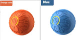 Textured silicone massage ball in orange and blue, circular power icon design, durable material