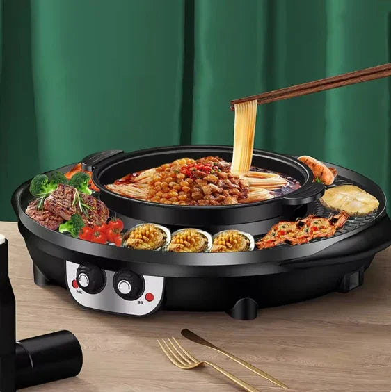 Electric hot pot grill combo with noodles, beef, seafood, and vegetables on a wooden table