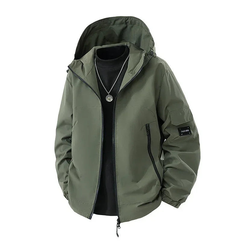 Olive green hooded windbreaker jacket with zipper pockets, relaxed fit, streetwear style