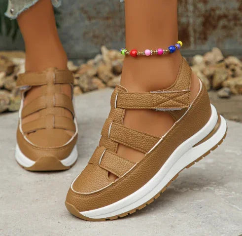 Tan vegan leather platform sneakers with cutout straps and white sole, casual streetwear style