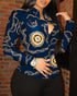 Woman wearing fitted navy blue baroque chain print shirt with button details and black pants