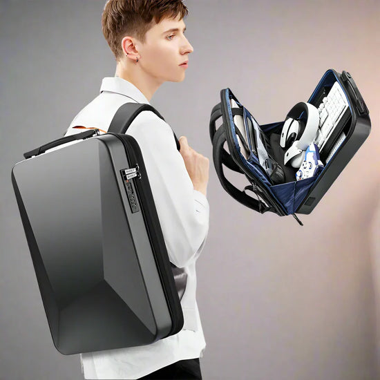Man wearing a white shirt with a sleek black hard-shell backpack, showcasing tech storage compartments.