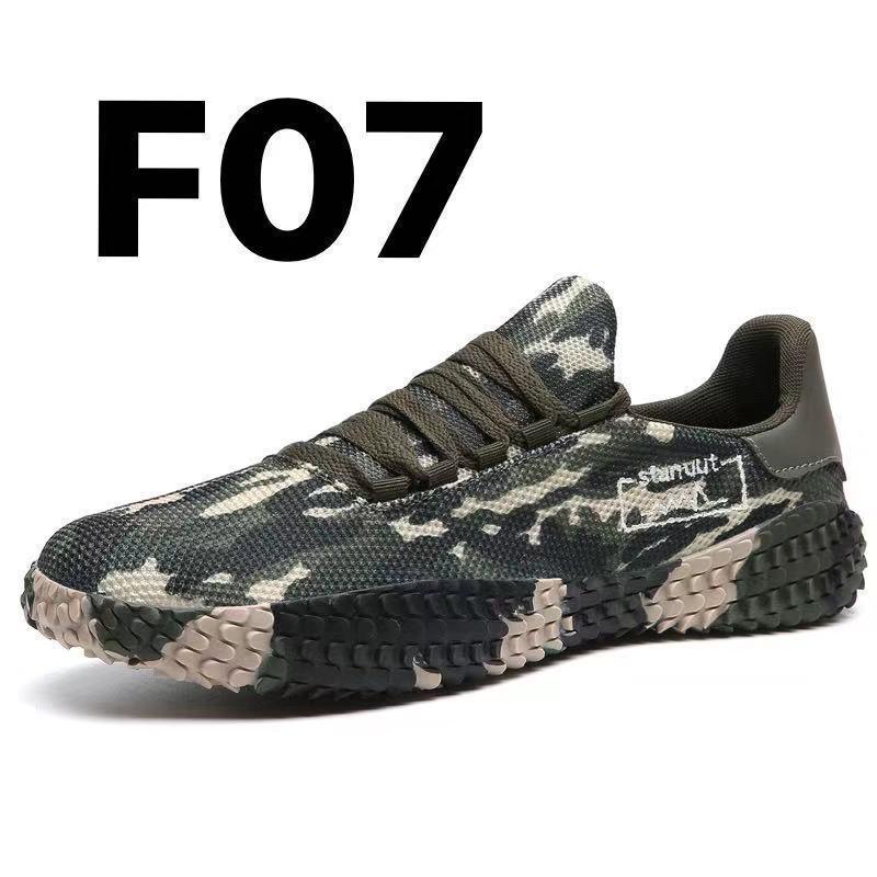 Green camouflage athletic sneaker with mesh material, chunky sole, and low-top fit