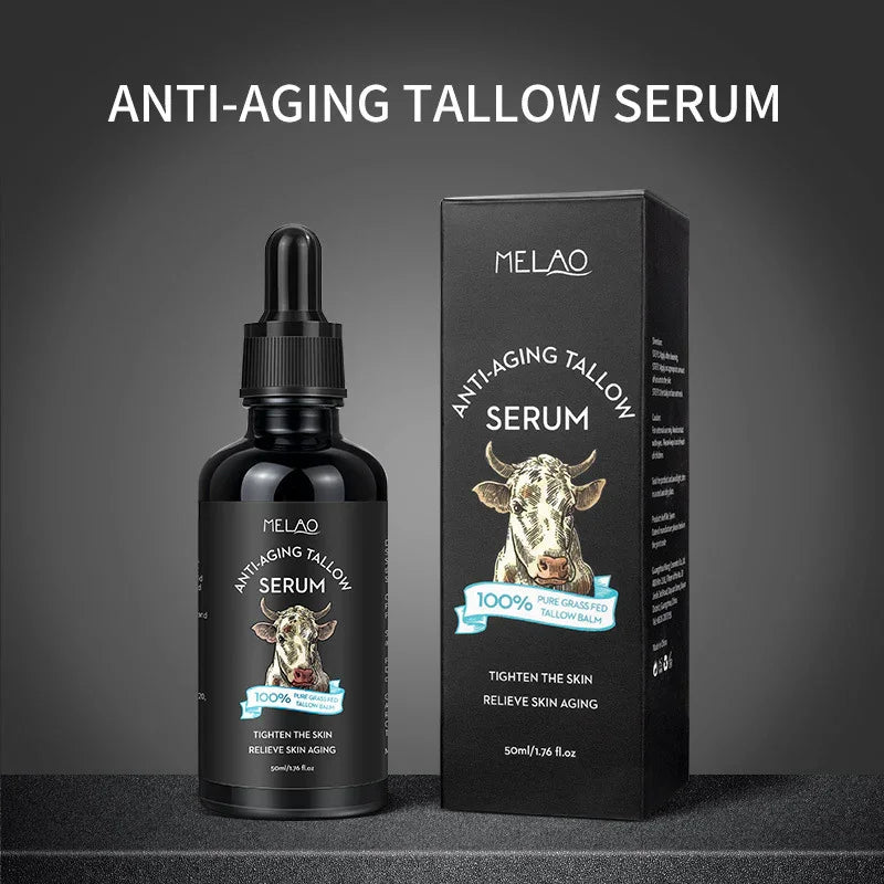 Black dropper bottle and box of anti-aging tallow serum with cow illustration, skincare product