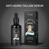 Black dropper bottle and box of anti-aging tallow serum with cow illustration, skincare product