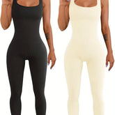 Women wearing sleeveless ribbed jumpsuits in black and cream, bodycon fit, stretchy fabric.