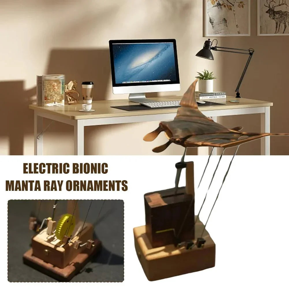Electric bionic manta ray ornament with metallic finish displayed on modern office desk.