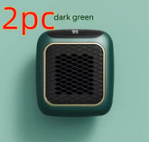 Compact dark green portable heater with digital display and black mesh front, modern design