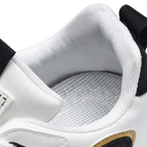 Close-up of white mesh athletic sneaker with cushioned collar and black accents