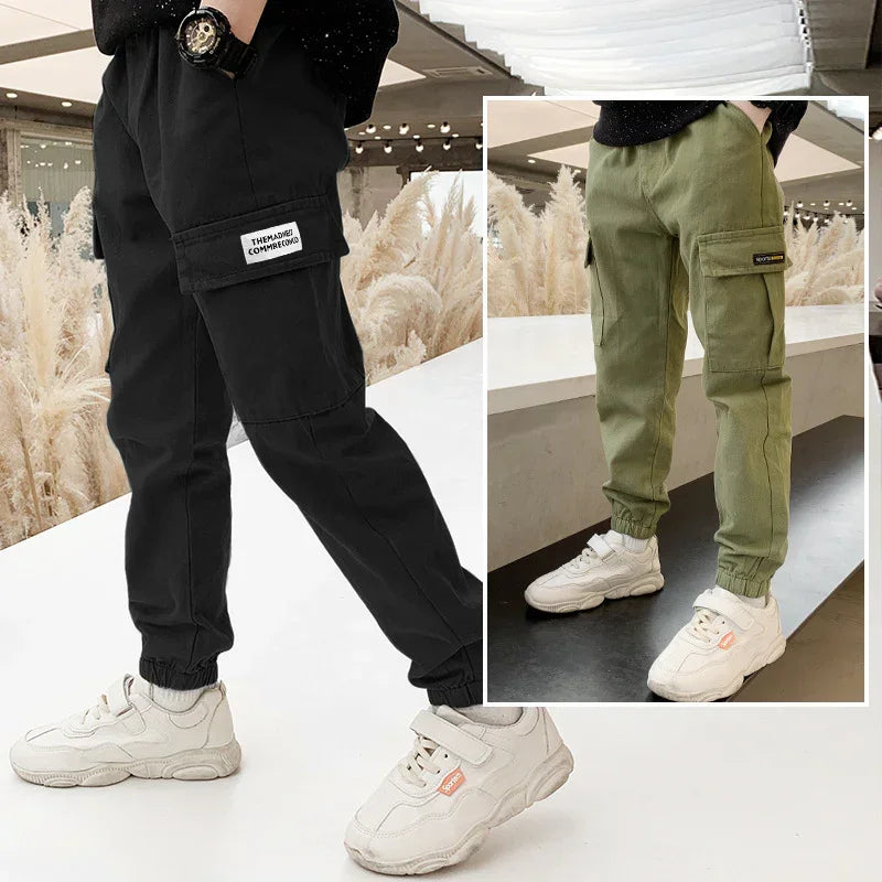 Men's cargo jogger pants in black and olive green, cotton fabric, relaxed fit, elastic cuffs