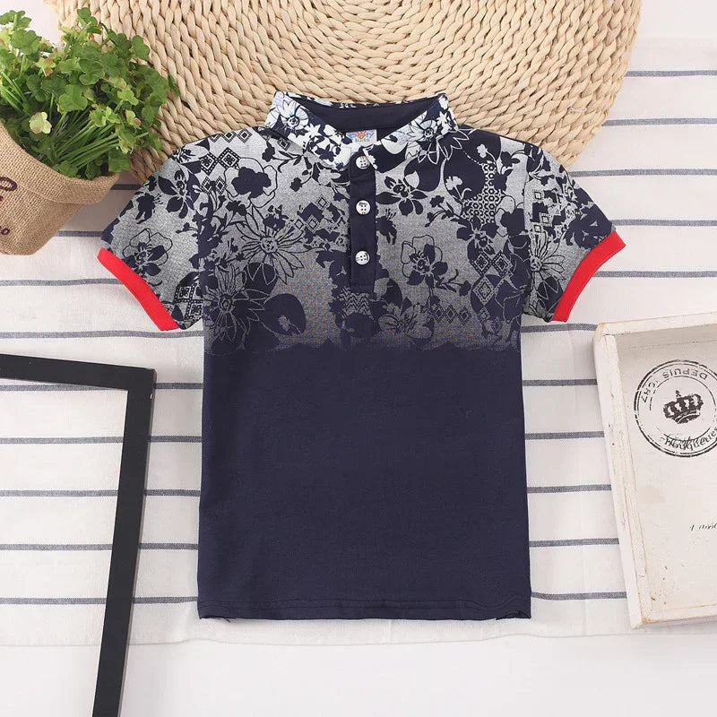Navy blue and grey short-sleeve polo shirt with floral print, red sleeve cuffs, slim fit.