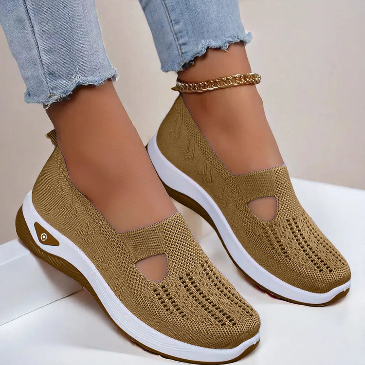 Light brown knit slip-on sneakers with white soles, perforated design, casual fit