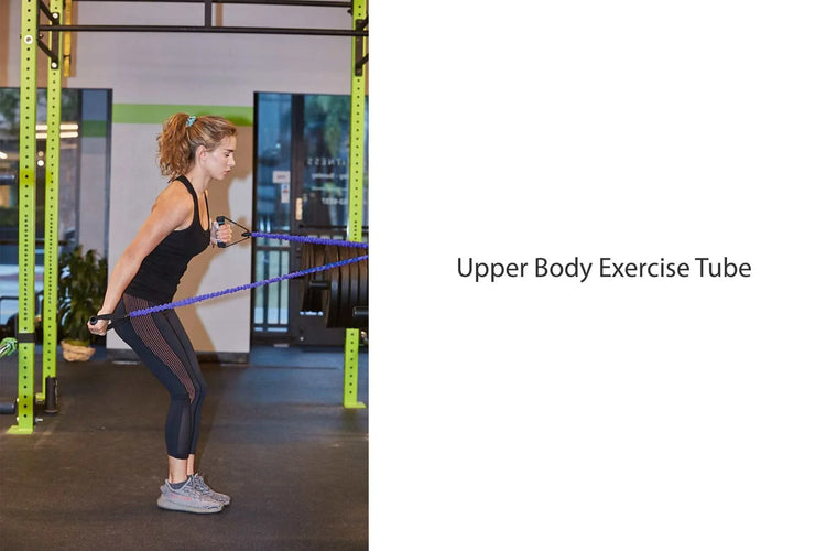 Woman in black fitted athletic tank top and striped leggings using resistance band for upper body workout